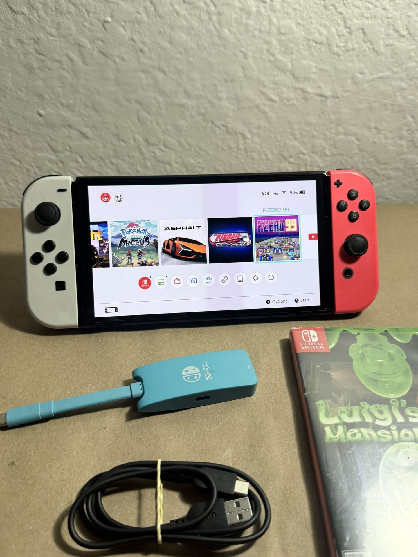 Nintendo Switch oled games included and memory card 64GB extra $220 Firm