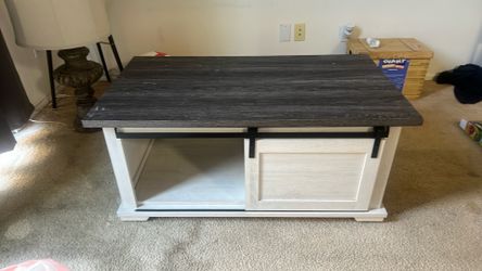 Farm house center table ashleys furniture