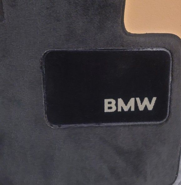 BMW SUV Black Carpeted 4 Piece Floor Mat Set.