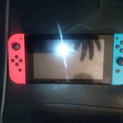 Nintendo Switch With The Game Red Dead Redemption 