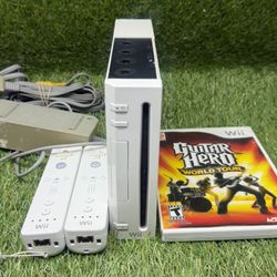 NINTENDO Bundle WII game console MODEL RVL-001 with 2 CONTROLLERS AND Guitar hero 