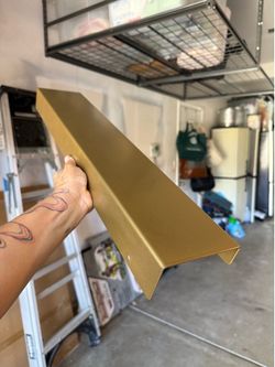 Gold metal shelf