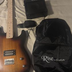 Electric Guitar With Amp And Case 
