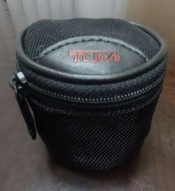TUMI Ballistic Nylon Premium Protective Case, specifically packaged as the dedicated storage pouch for a TUMI Universal Travel Power Adapter.