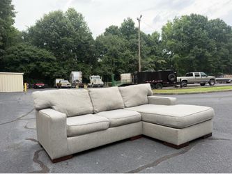 Light Grey Ashley Sectional ( Delivery Available)
