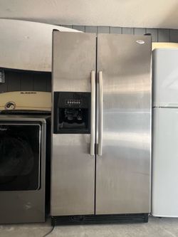 Whirlpool stainless steel side by side refrigerator freezer