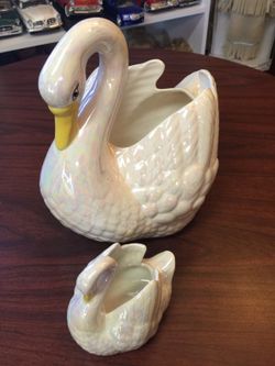 Two beautiful swan planters