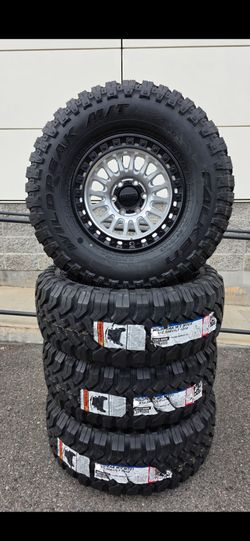17" KMC w/ 37" Falken Wildpeak MT tires