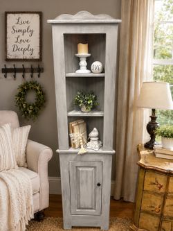 Rustic refinished corner cabinet painted in grey