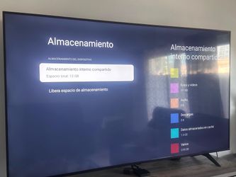 TV sansumg de color negro de 75’’