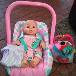 BABY DOLL AND CAR SEAT 