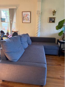 IKEA couch - pull out bed + storage