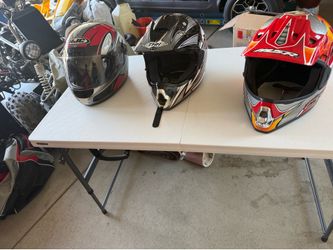 3 motorcycle helmets
