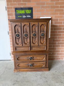 Armoire with shelves and drawers