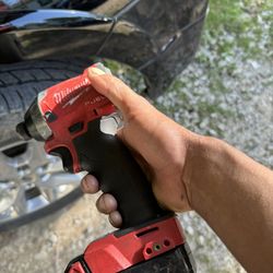 Milwaukee Fuel M18  Impact Driver  & 5.0ah Battery