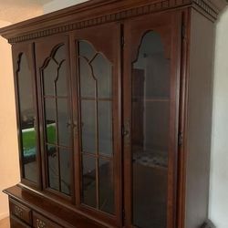 Open the table with matching hutch real cherry wouldTable with matching hutch real cherry wood.