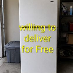 Kenmore top-freezer refrigerator in good working condition. Clean and ready 