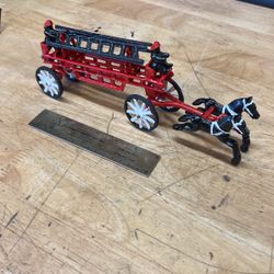 Vintage cast iron fire wagon restored