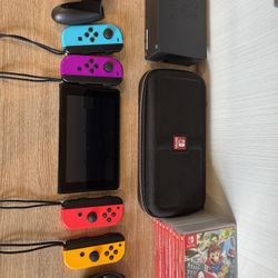 Nintendo Switch (9 Games, 4 Joy-con Controllers + Switch Case)