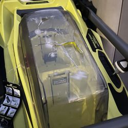 BRAND.  NEW.  Ryobi.   40. V.  Cordless.   Lawn Mover.    