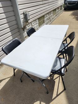 Folding Table with Four Chairs
