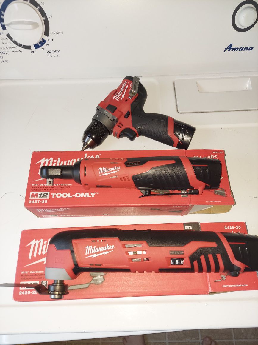 Like New set of 3 Milwaukee Power Tools Drill, Multi Tool, Cordless Socket + 3 batteries