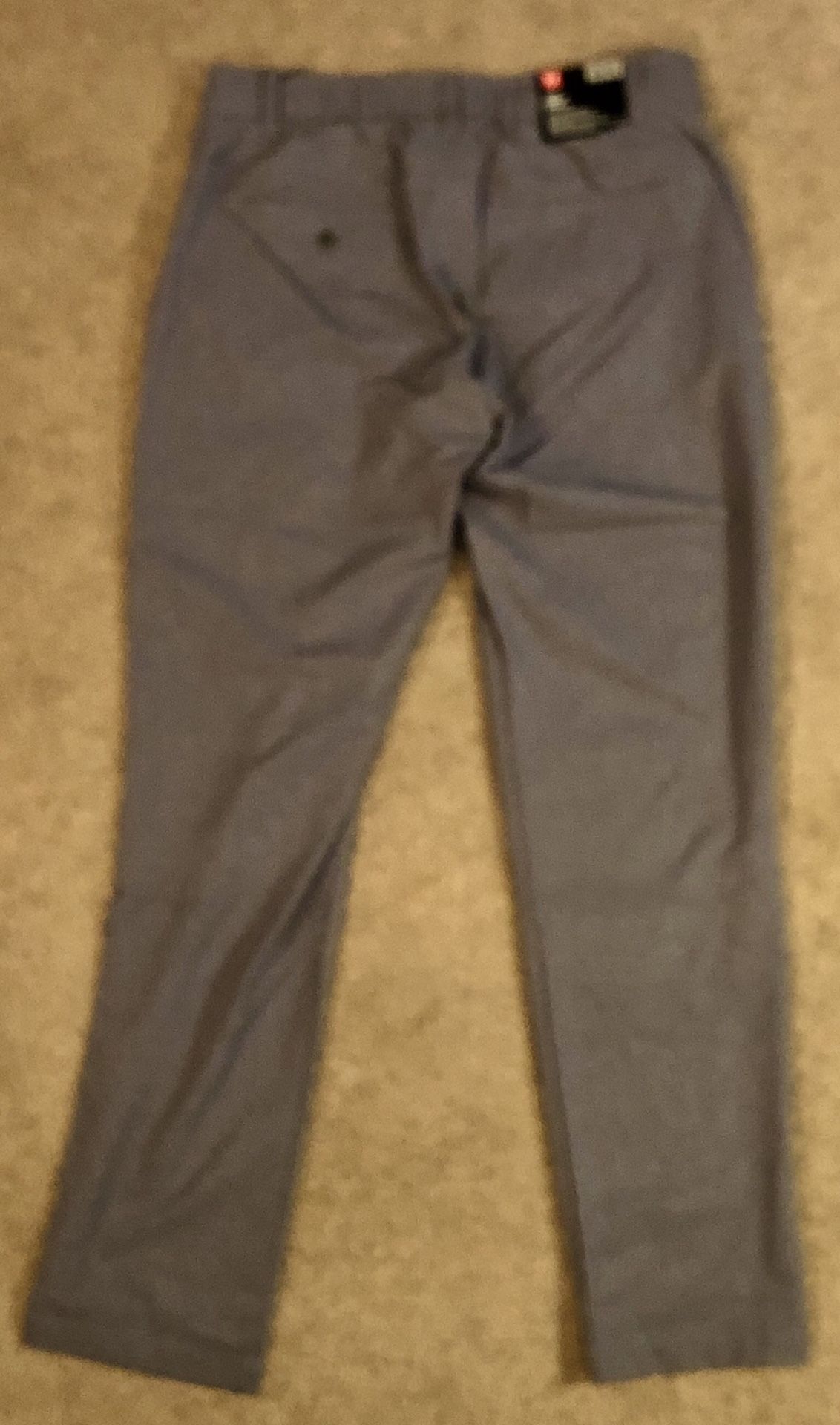 Under Armour golf pants. NEW. 34W