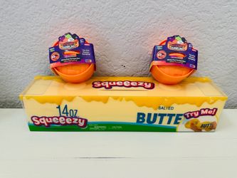 Butter Squishy Squeezy Brand and two mini dumpling Halloween purple.