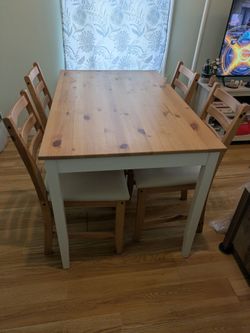Ikea Lerhamn dining table with matching chairs