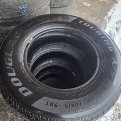 4 tires 215/70/15 Douglas Touring A/S
