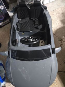 Kids Audi Remote Control Car w/Bluetooth Speaker. Does need a new battery, picture of battery.