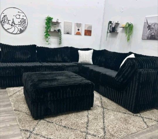 Beautiful sectional couch with matching ottoman