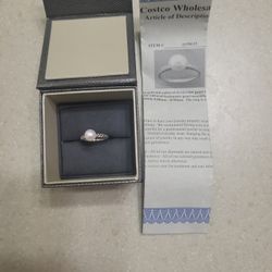 14 K White Gold Ring With Pearl.  Weight is 3.5 Grams.  Brand New 