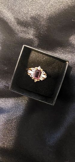 Gold ring with gemstones