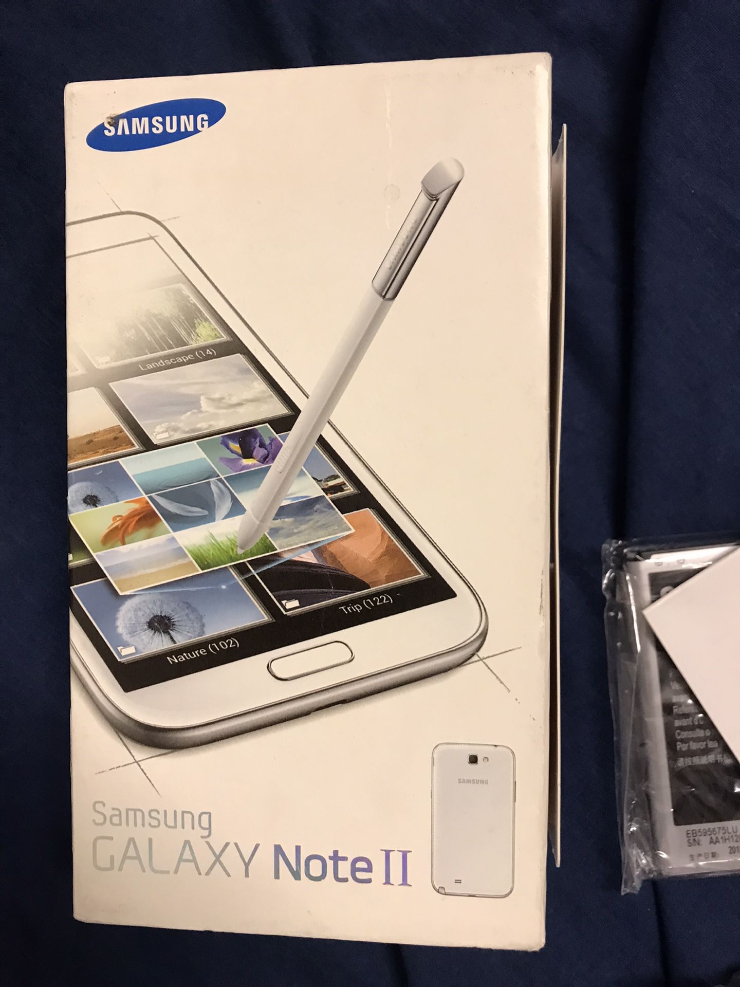 Samsung galaxy Note II Brand New in an open box. Comes with Battery, Charger , Headphones and manual. COLLECTIBLE ITEM