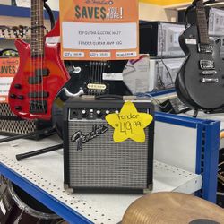 Eso Guitar And Fender Guitar Amp