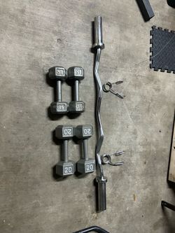 Curl bar with dumbbells will come with a pair of 10 lbs 2 inch plates for the curl bar