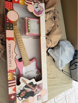 electric guitar and amp  toy pink fao schwarz