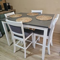 Table And Four Chairs