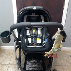 Graco SnugRide SnugFit DLX Infant Car Seat Featuring Safety Surround System