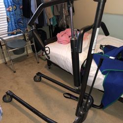 Patient lifter with divided leg sling.