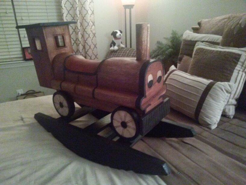 Hand carved antique all wood childs rocker or just a great decorators piece