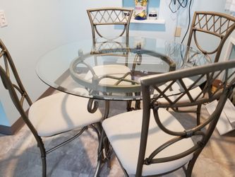 45 inch round heavy beveled glass table and 4 chairs