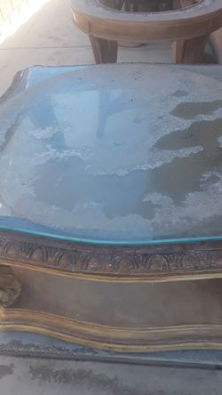 Center table with glass. Needs alittle paint. Heavy $15