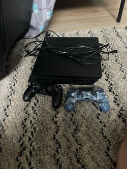 PS4 PRO 1TB GB Storage comes with two controllers