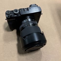 Fuji Gfx 50R.  With 32-64mm