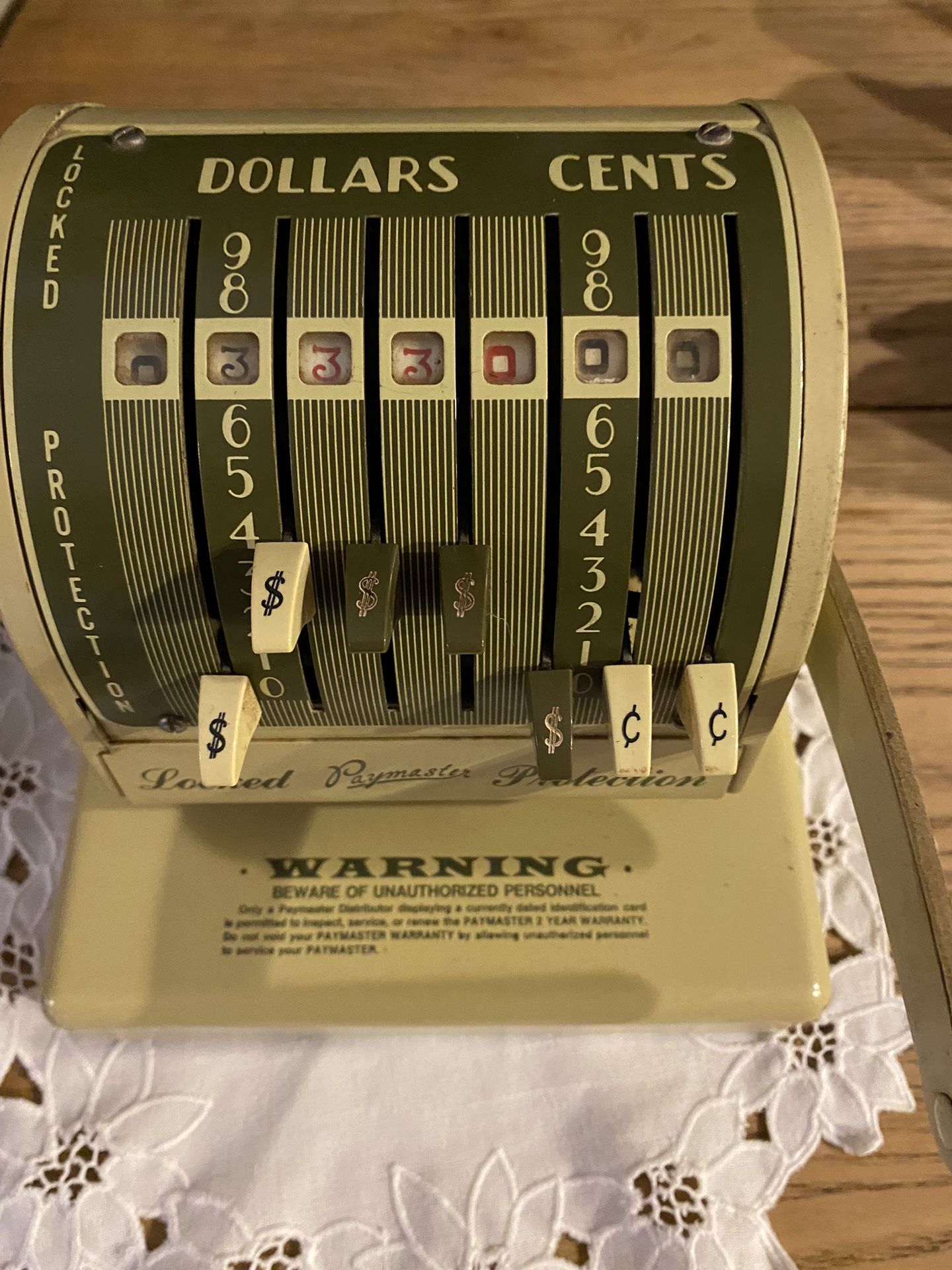 Antique check writing machine with key