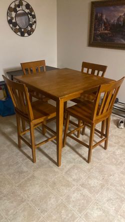 Hardwood dining table and 4 chairs