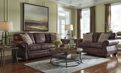 New Ashley sofa and love seat at wholesale Furniture Center 25 w 39th street Kansas City mo 64111