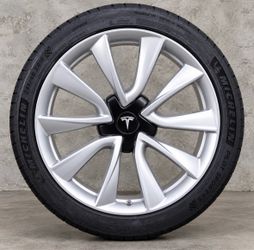 Set of 4 stock Tesla Rims (dmg)